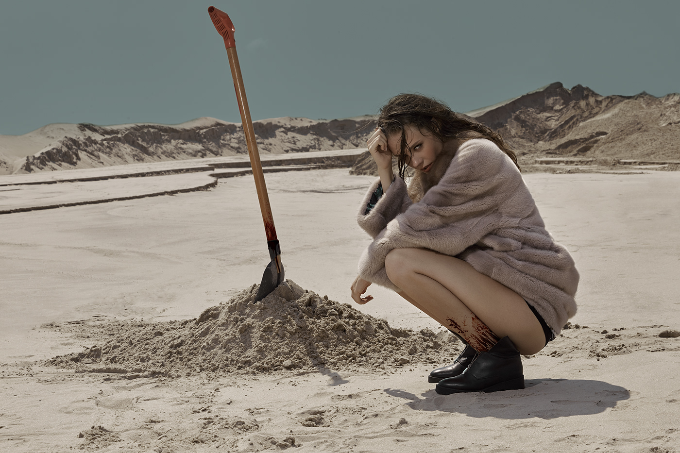 sand shovel blood girl desert