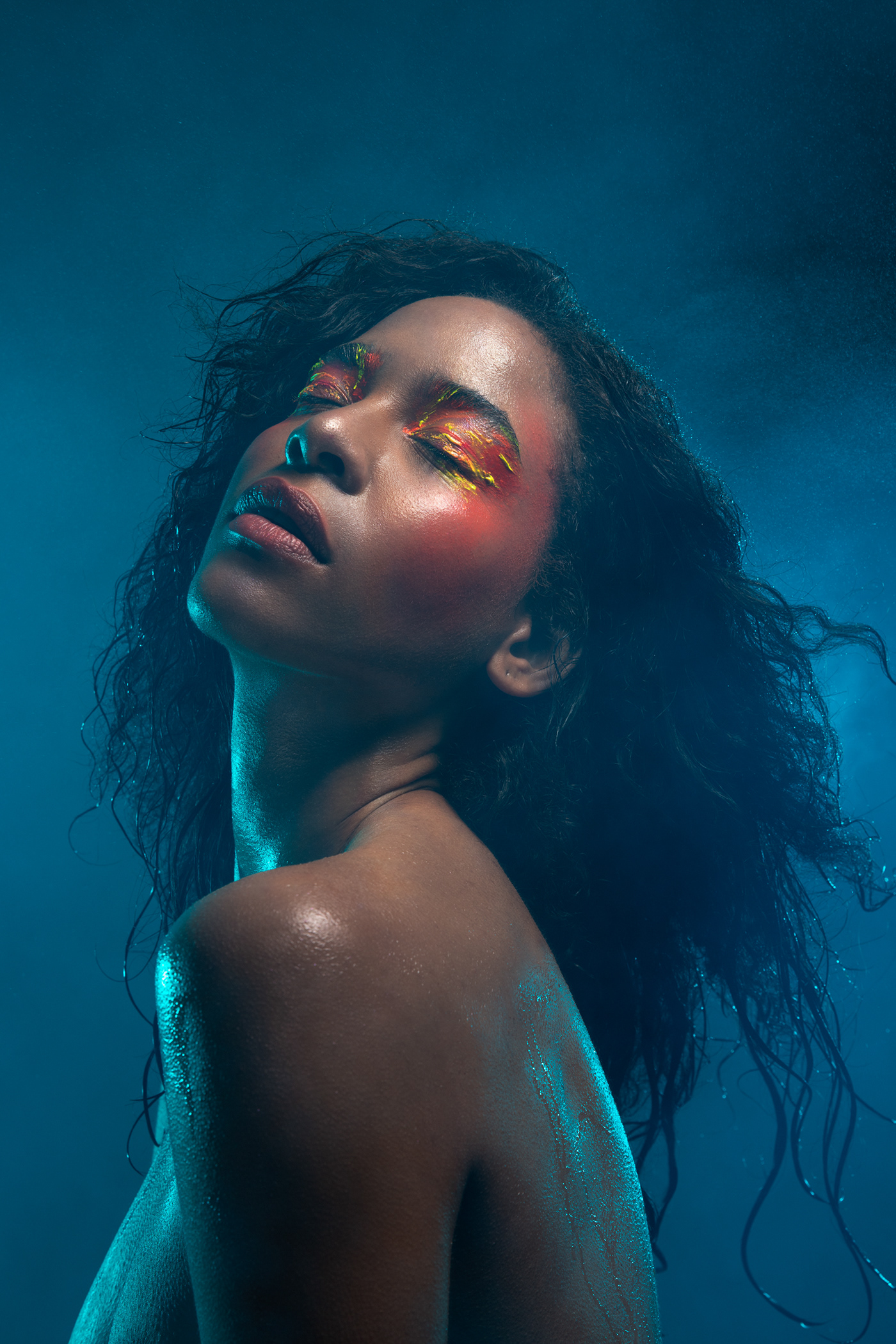 afro black model hair skin dewy wet underwater cold cosmetics makeup