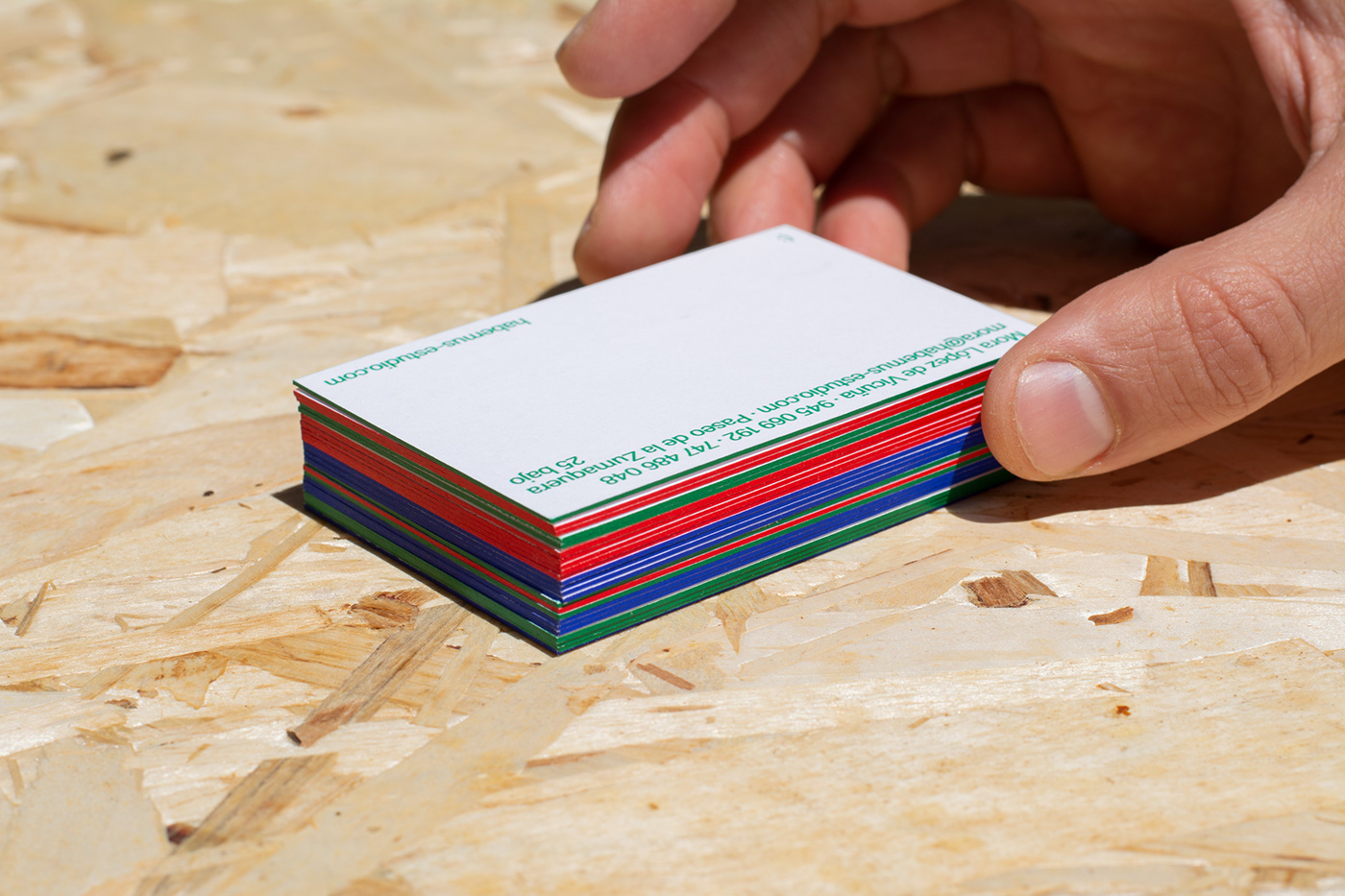 different color stacked business cards 