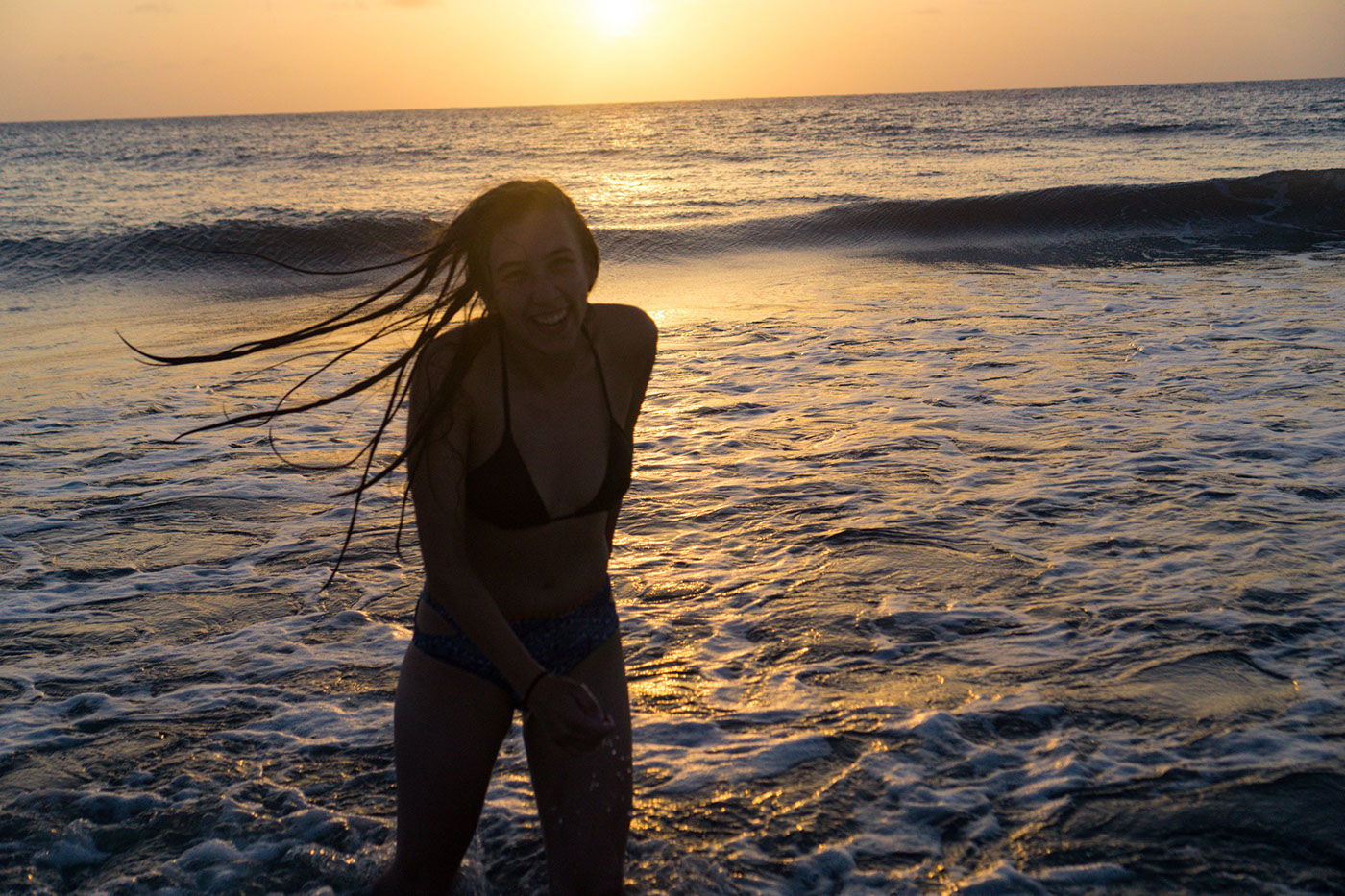 women water Ocean waves splash photo golden-hour smile sexy bathing-suit