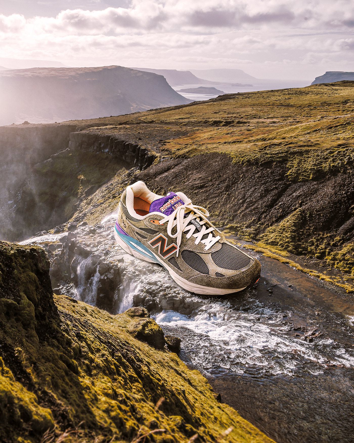 Giant sneaker photo composite next to a waterfall . Retouching using Photoshop