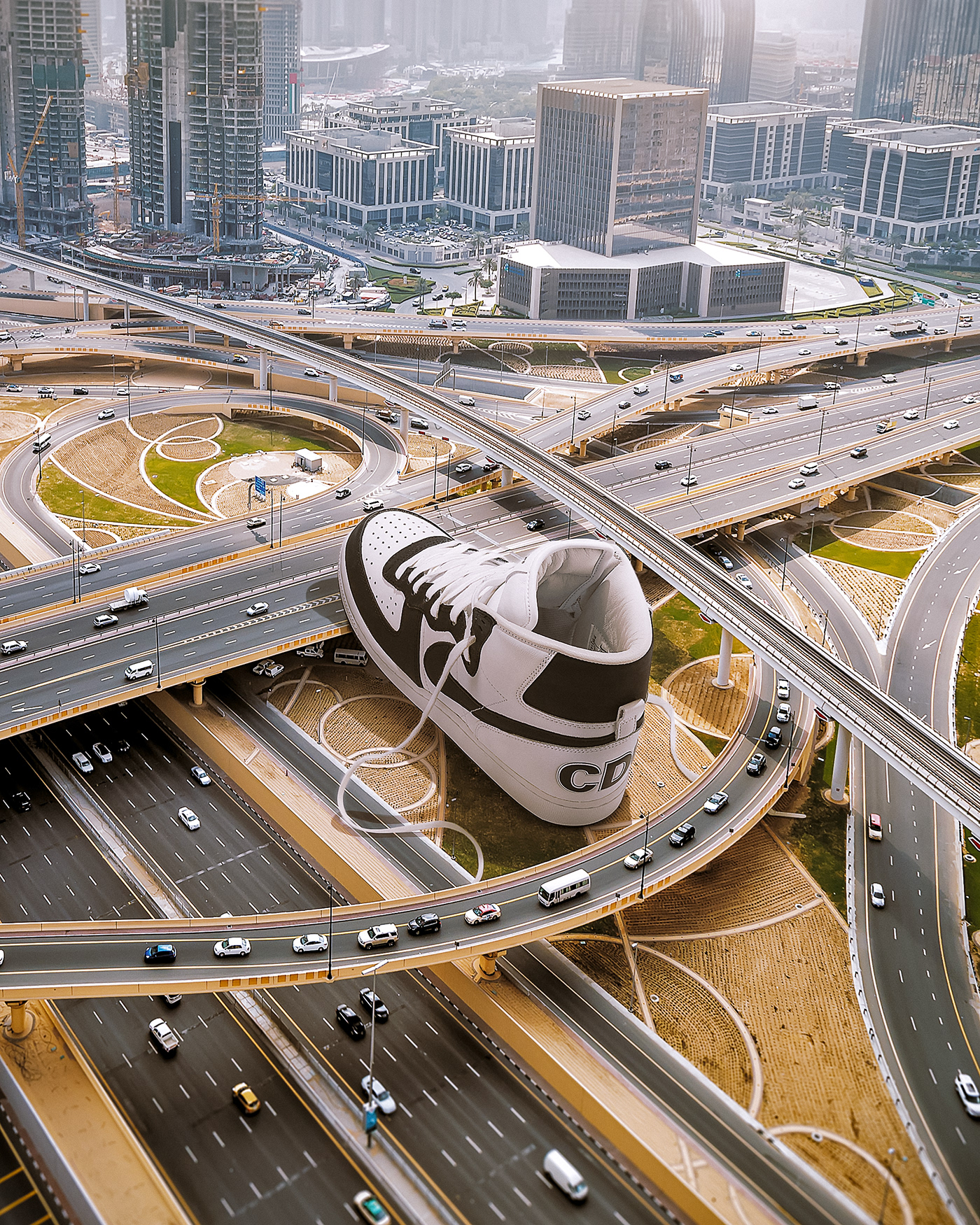 Giant sneaker photo composite in Dubai. Retouching using Photoshop
