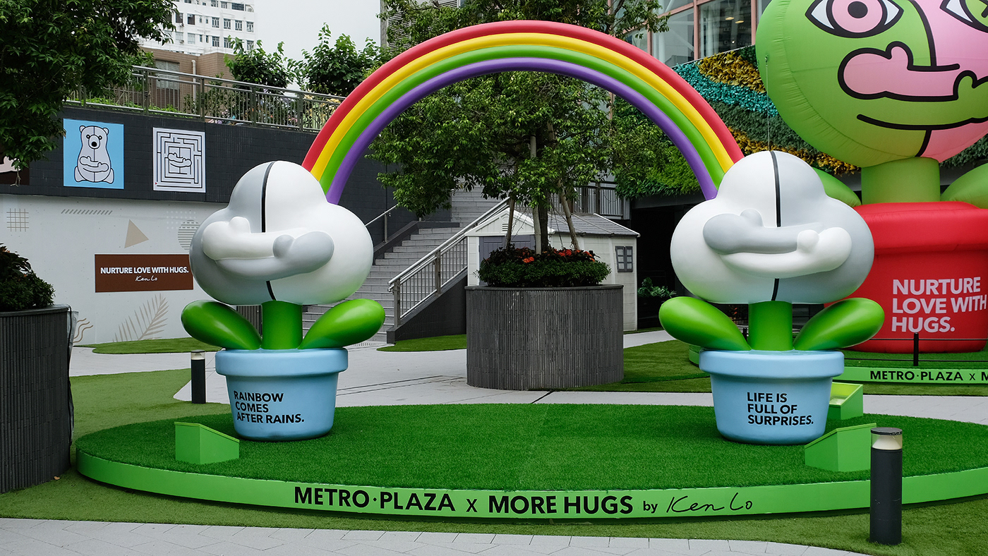 public art inflatable installation shopping mall bold colorful artwork more hugs