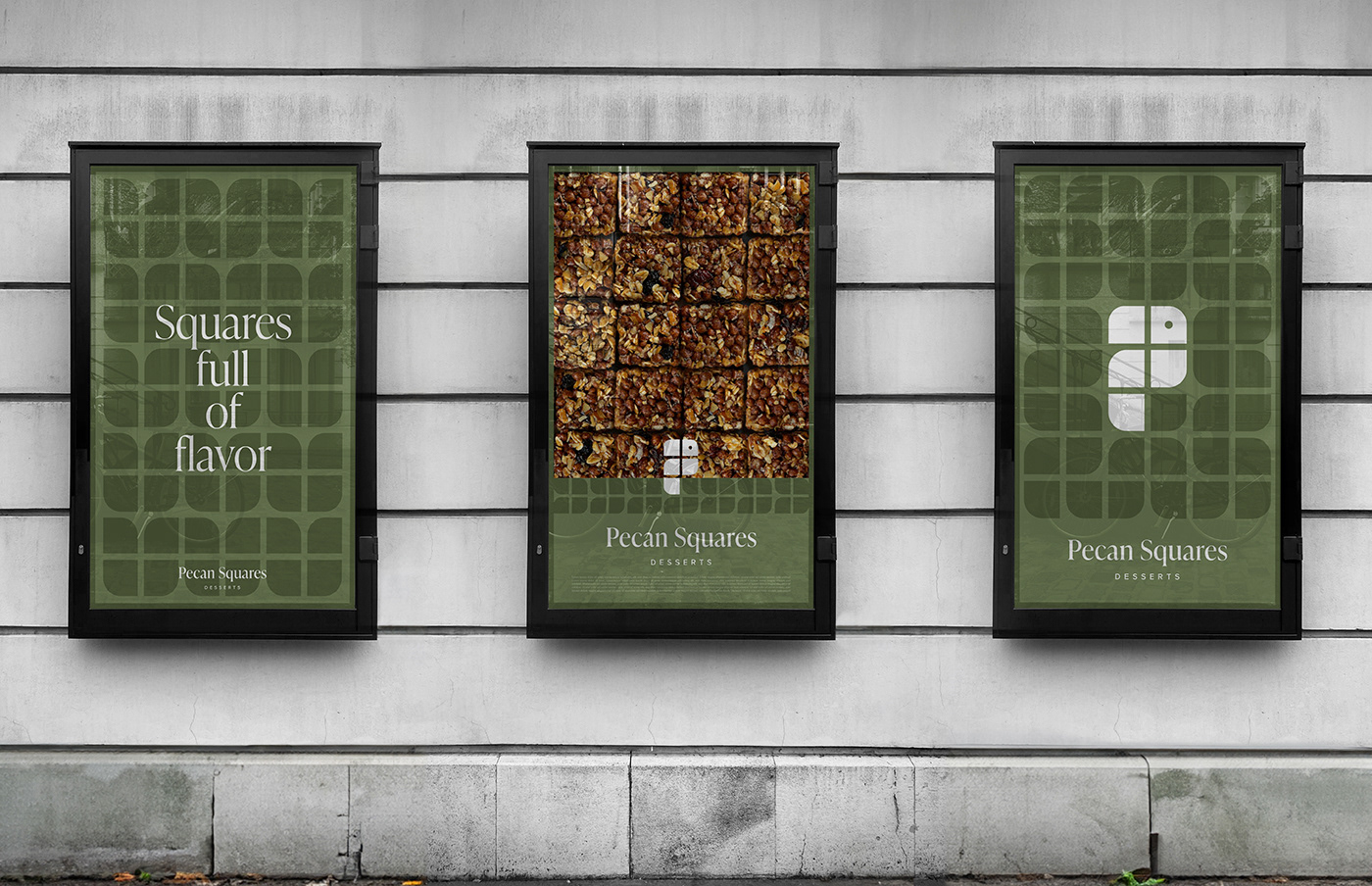 Three posters of the Pecan Square dessert brand placed in the streets