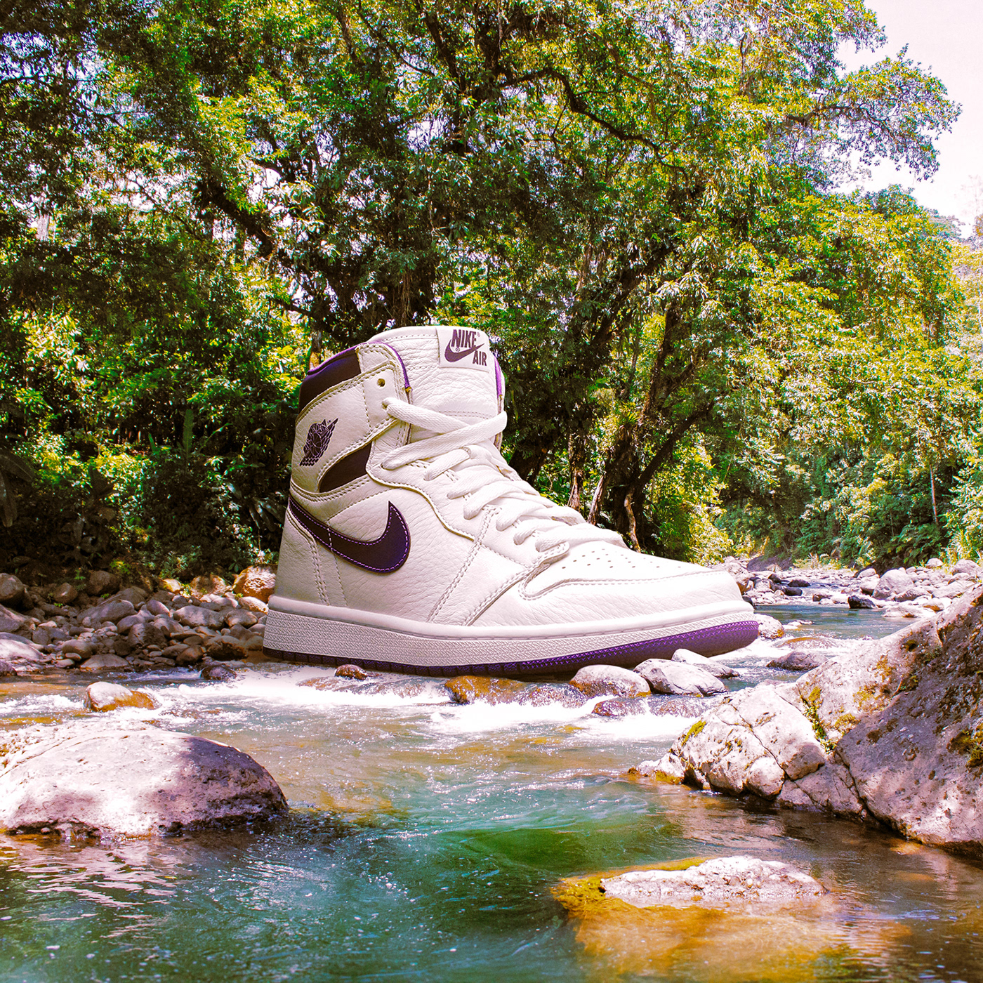 Photo composite of giant sneaker in nature. Retouching using Photoshop
