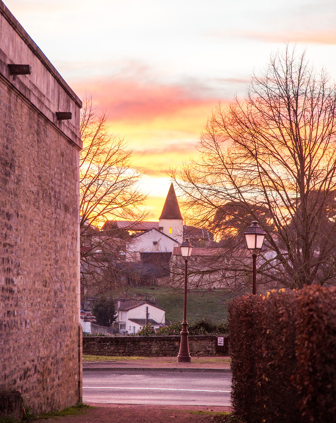 December sunset French town bw