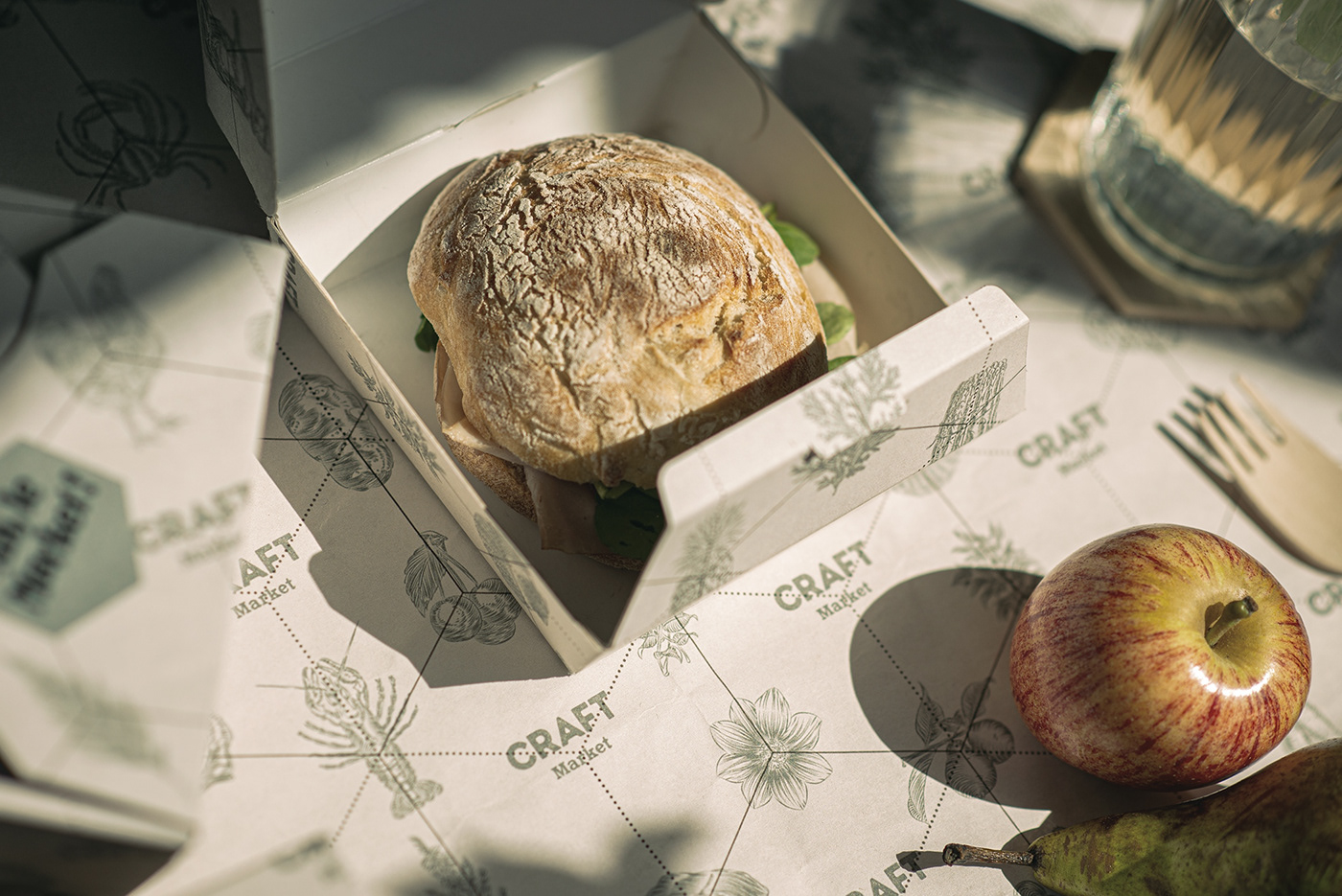 Closeup of CRAFT Market restaurant takeaway packaging.