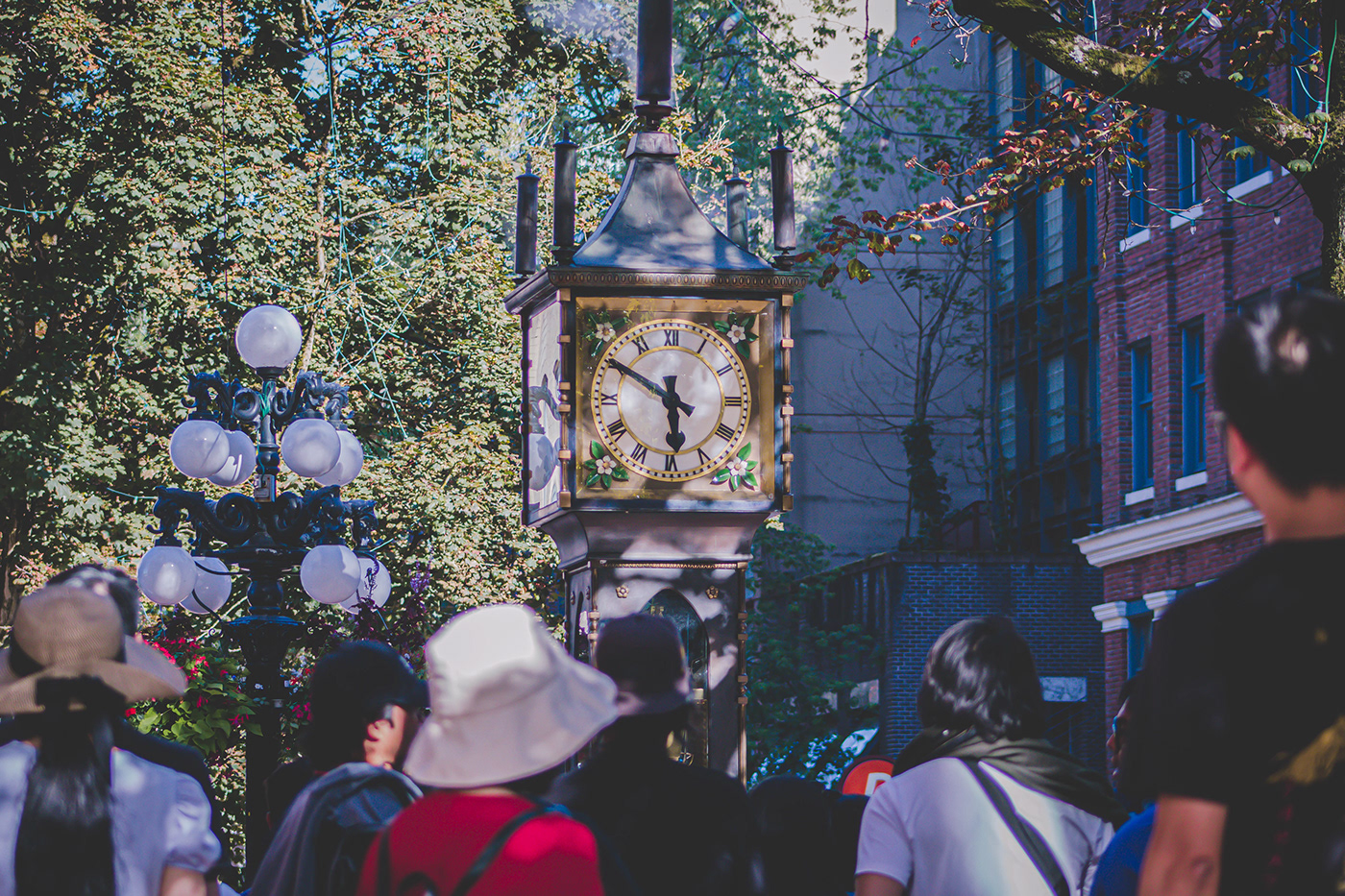tourists city downtown culture people steam clock