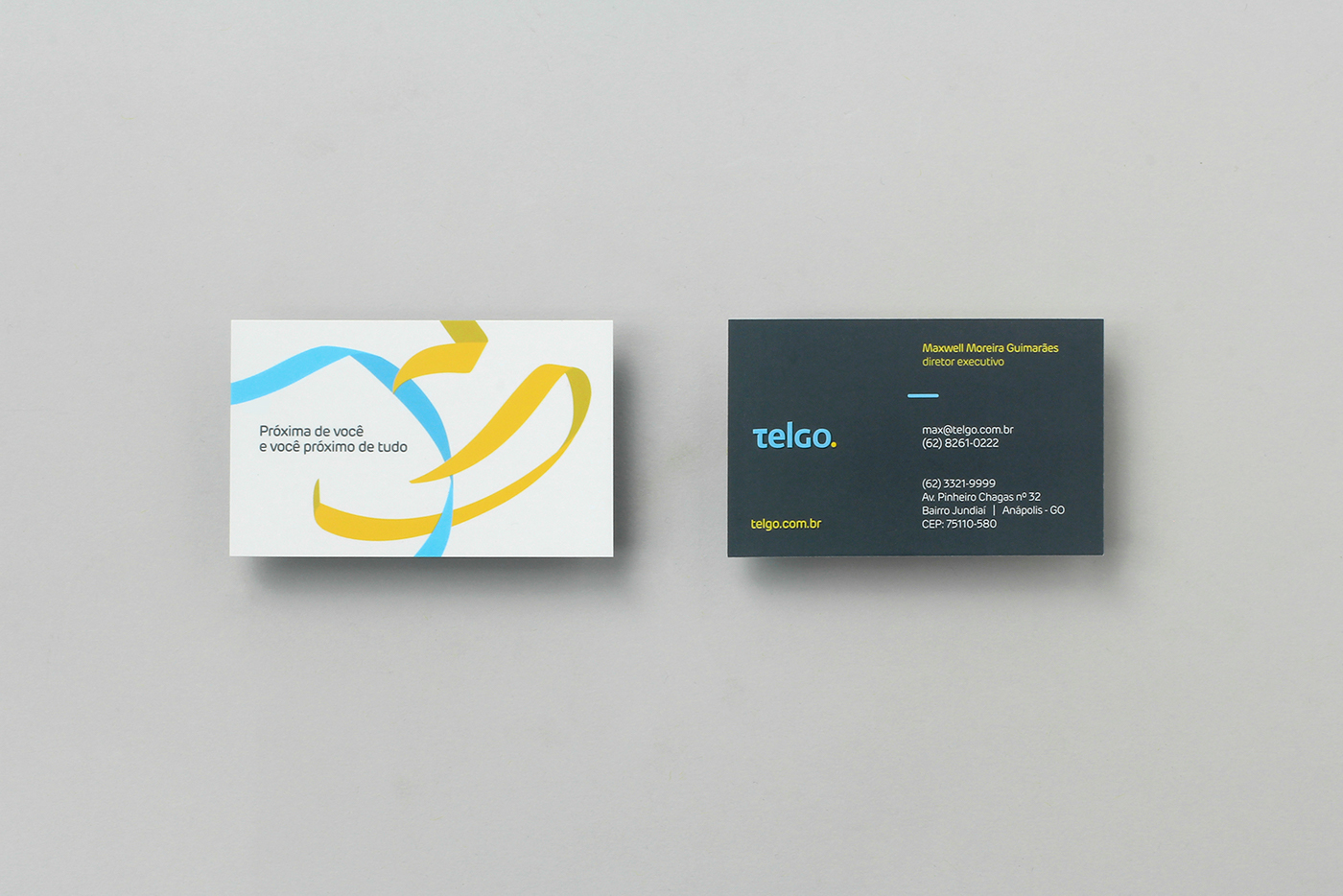 brand positioning brand identity Corporate Visual Identity yellow blue ribbons Telecom telecommunications Internet icons Minimalism