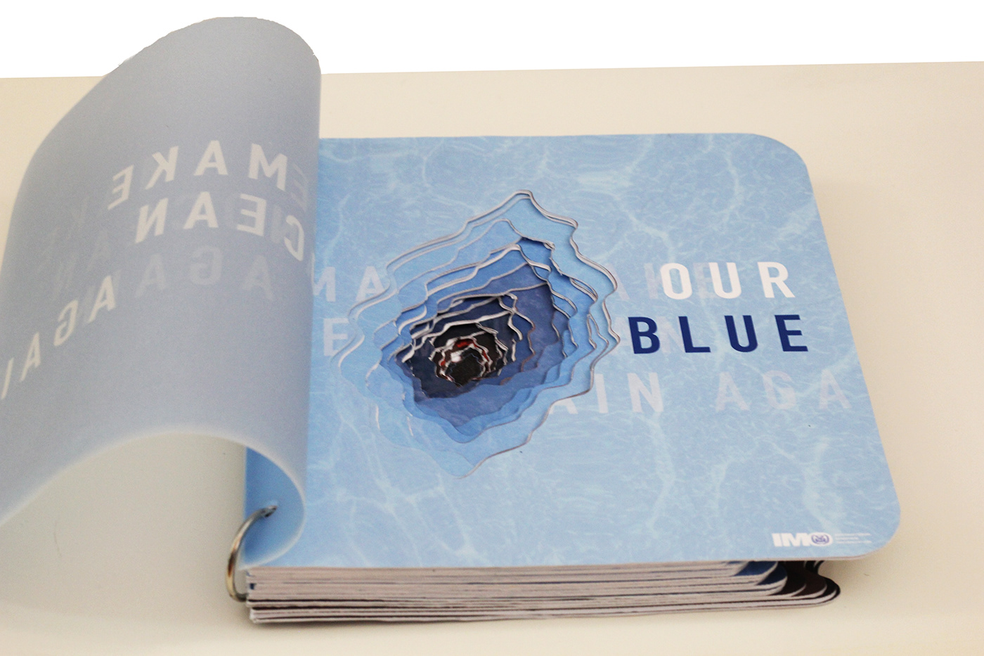 Blue again. «Die Cut hold-to-Light» - перевод. A book with a Cut inside.