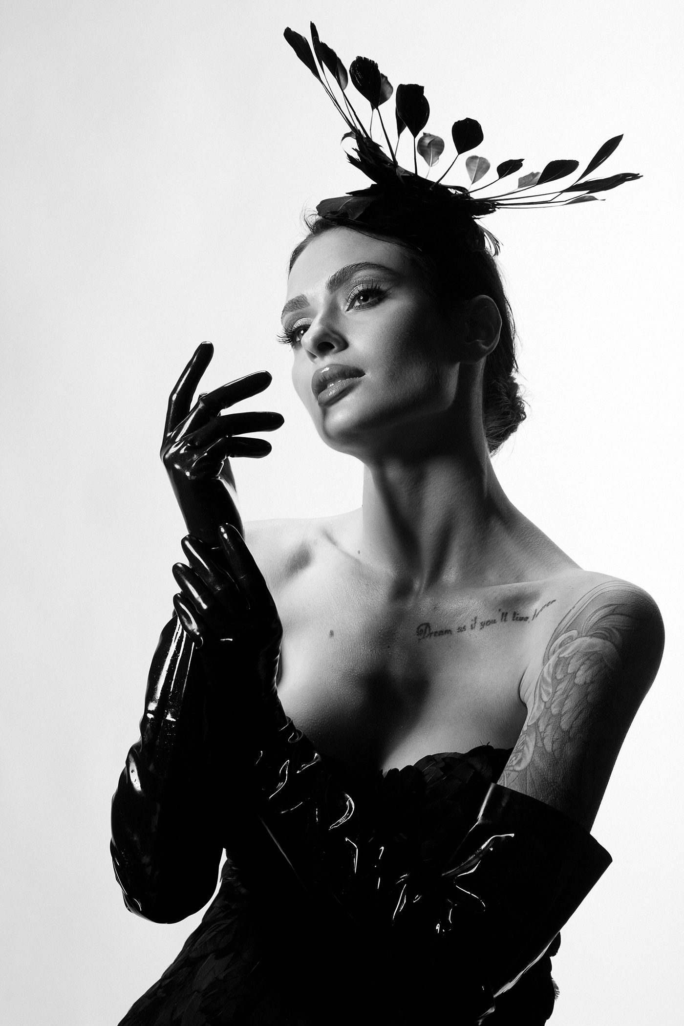 black and white Fashion  fashion photography feather Female portrait film grain headdress modelling portrait vogue