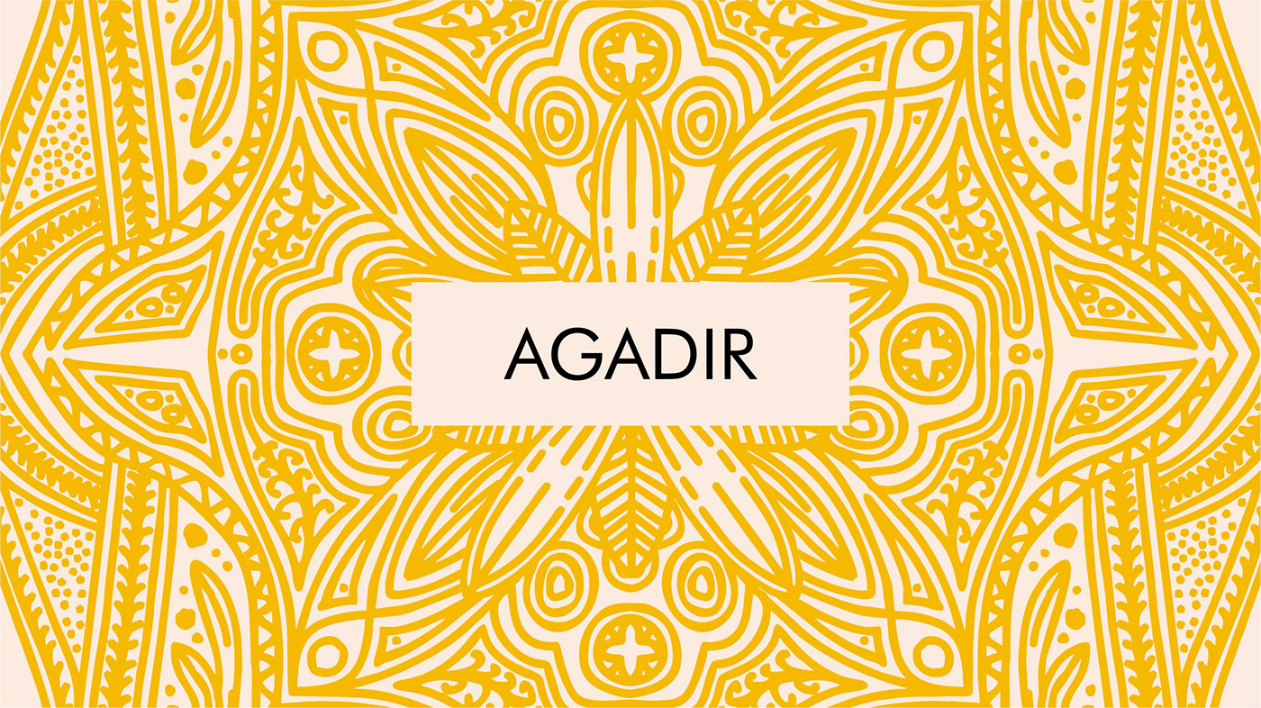 Yellow ornamental illustration for "Agadir", featuring neroli buds