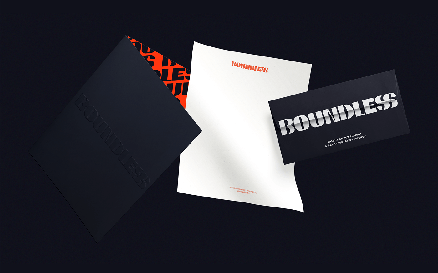 Folder with embossed logo and bright orange pattern on the inside, branded letterhead and envelope