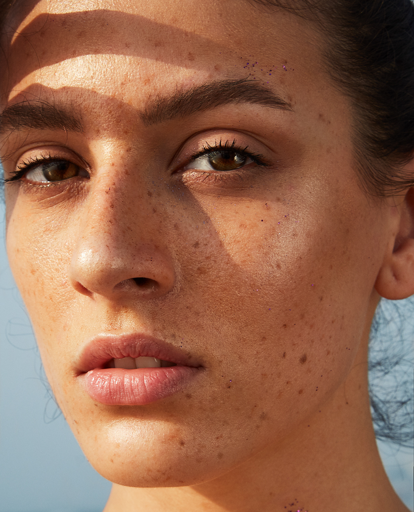 Sun skin skincare cosmetics glitters sparkles beauty portraits