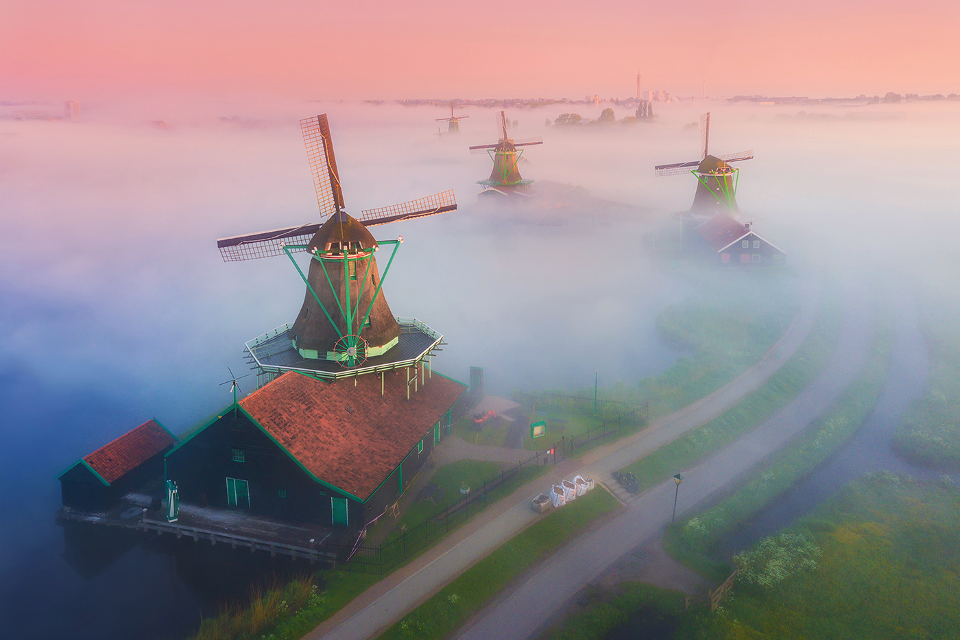 dutch windmill zaanse schans amsterdam The Netherlands fog