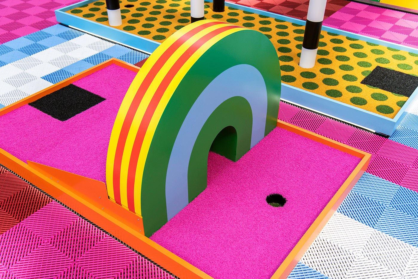 colorful immersive installation interactive mini golf pattern Playground sculpture
