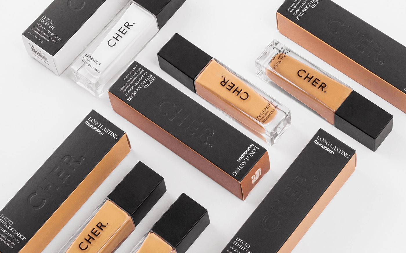Packaging and labels for foundation with embossed logo, minimal typographic design and color tone