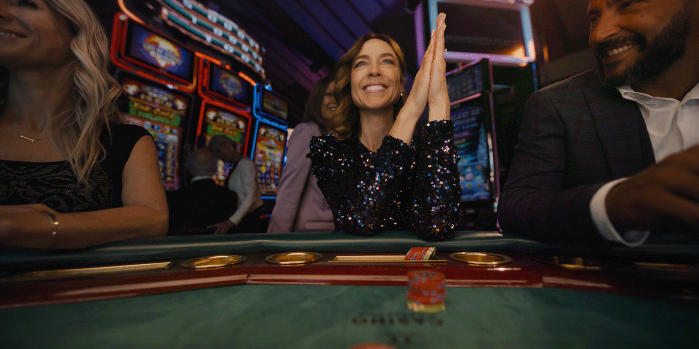 A woman playing blackjack at a casino