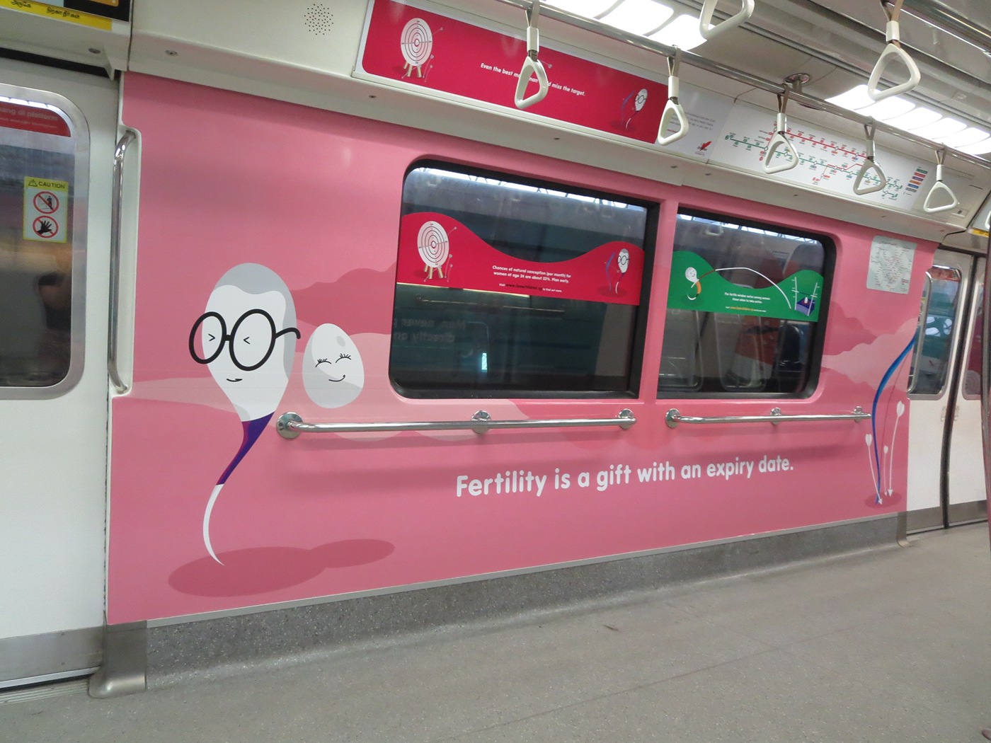I love children fertility campaign OOH out of home singapore MRT taxi animated video sperm egg train train station public quirky
