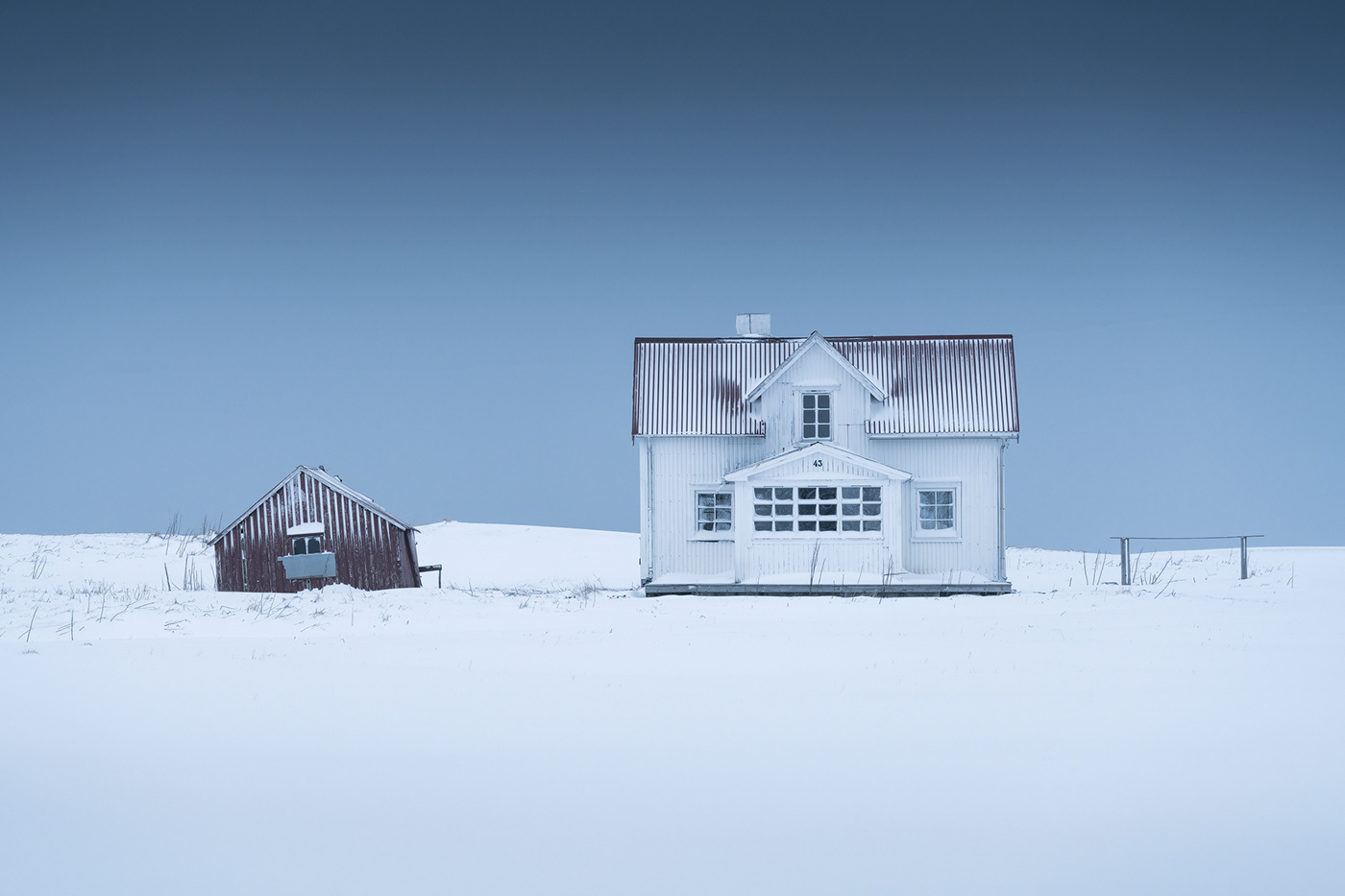 lofoten minimalist norway snow winter Arctic Circle cabin house snowstorm