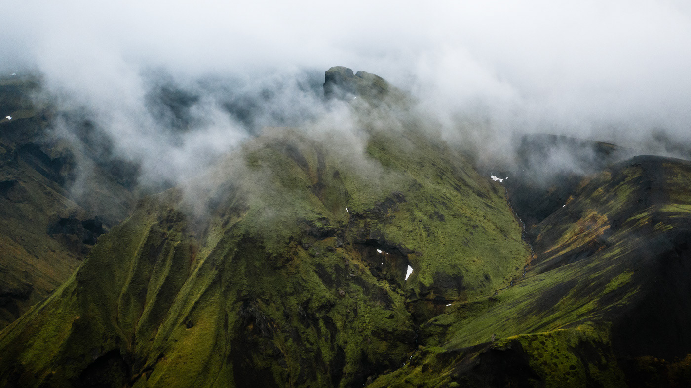 Aerial Landscape iceland mountains fog Moody clouds river drone Highlands
