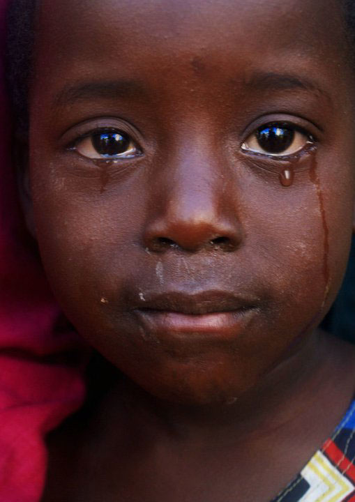 orphan children africa Uganda sad child girl crying tears