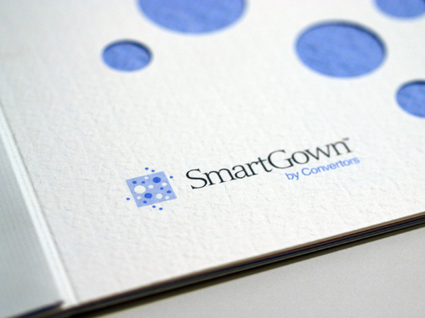 logo identity paper die-cut binding brochure tactile mailer