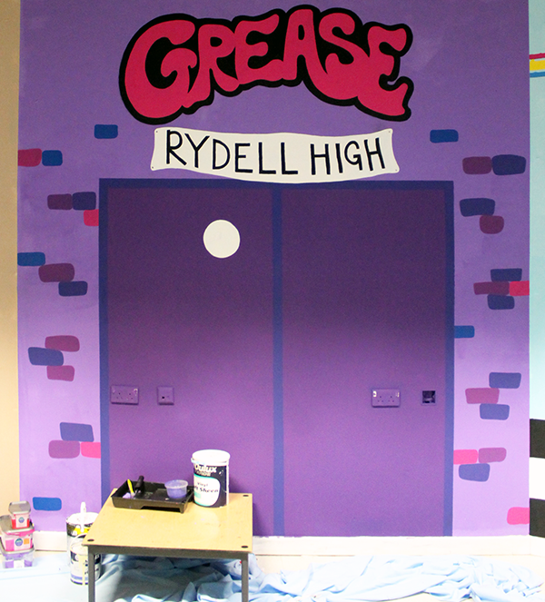 grease school production paint 50s diner gym Retro bright colours college play concert Performance programme