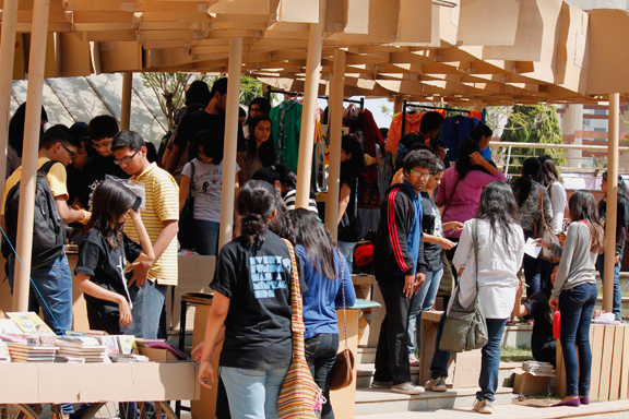 store cardboard college festival student group elephant exhibit product sale corrugated company roof canopy grid