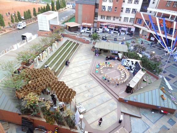 store cardboard college festival student group elephant exhibit product sale corrugated company roof canopy grid