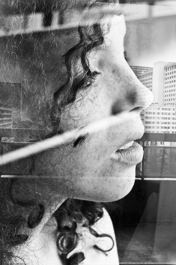 woman Window city portrait black and white