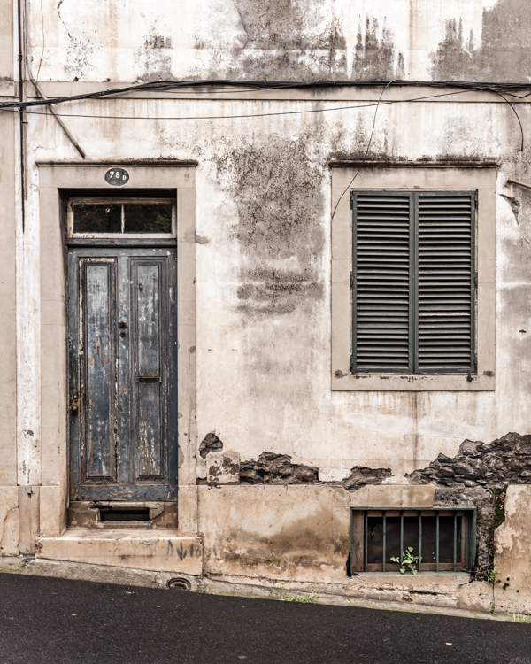 architectural Urban design geometric facade Window door weathered worn texture Madeira Portugal Europe