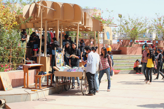 store cardboard college festival student group elephant exhibit product sale corrugated company roof canopy grid