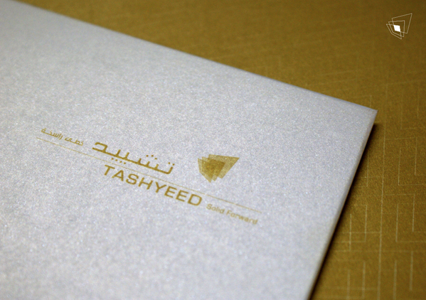 properties Tashyeed holding building real estate gold Bahrain logo stationary identity Website arabic Arabic logo