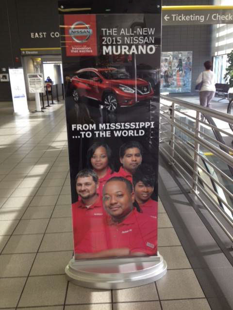 Nissan canton Mississippi employees billboard newspaper banner