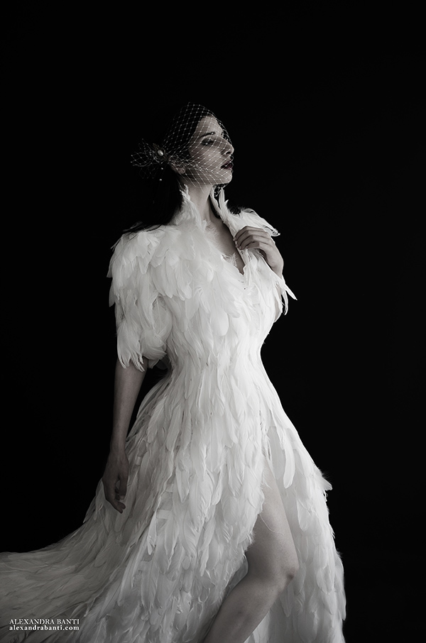 bird feathers swan coat woman