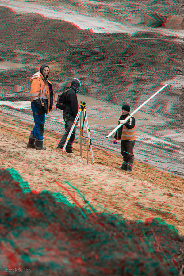 3D anaglyph red-blue glasses rain running Workers excavators digging wroclaw