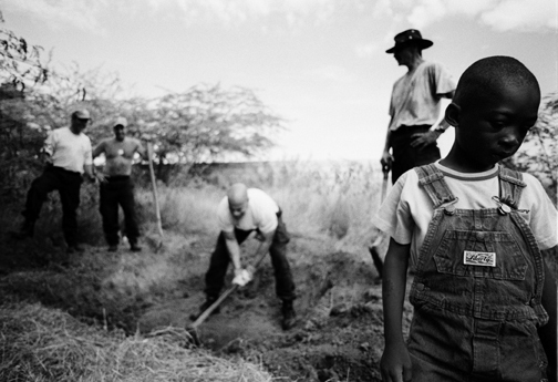 Haiti political oppression Port de Paix Gonaives Jean-Bertrand Aristide Gérard Latortue Boniface Alexandre hurricane jeanne port Au Prince politics civil-war rebels refugee anti-aristide Cite Soleil bel air MINUSTAH Brazilian Marines U.N. national Haitian police Nationale d'Haiti death Poverty child orphan orphanage destitution Cry pain loss b&w Human Condition reportage Military francophone French South America tanks weapons Caribbean