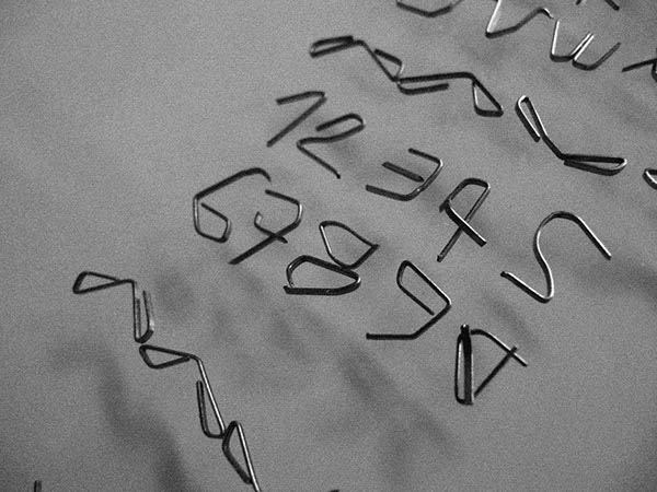 Staples handmade typo tipografia Portugal almada lisboa fagulha stapling staples font font type manual job ceramic metal