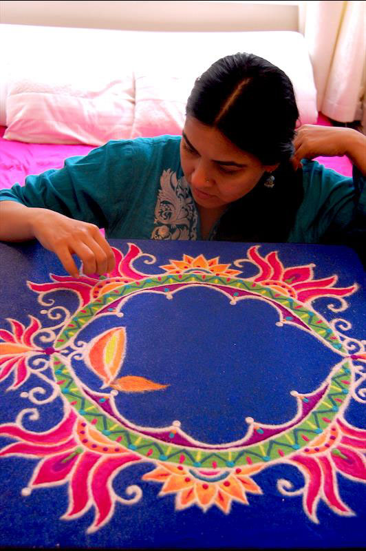 o2 London british indianart rangoli Diwali sandart art freehand Patterns UK australian artist pakistani blue commercial