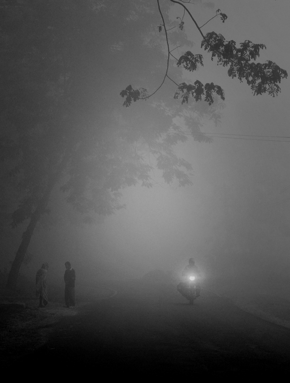 black and white community fishing mist assam GUWAHATI India northeast india