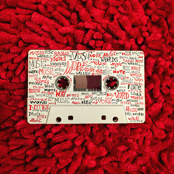 words, notes, music on a cassette tape