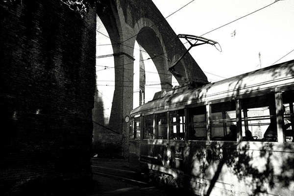black & white reportage Rome tram train rails analogic Urban city people Italy Street