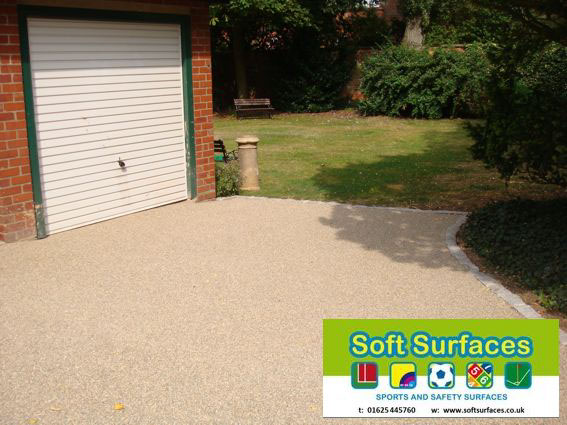 Surfaces surfacing resin Bound bonded gravel stone driveway walkway install resin bound resin bonded installation company soft surfaces ltd