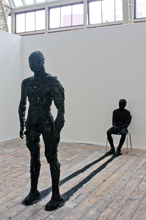 shadow Glue Gun black mannequin chair terrence koh Performance carl Jung psychology sculpture life size change become desire perfect rook floro