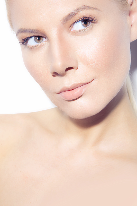 clean beauty model fresh blonde skin color make-up close-up
