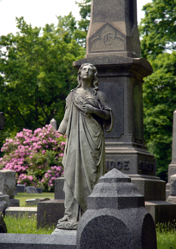 cemetery  woodlawn cemetery  mark twain ernie davis  hal roach  flowers   sculptures  statues  angels