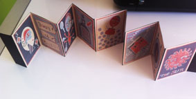kurt schwitters  book  concertina lino  print handmade  fortune telling  sun  moon Wheel of Fortune wealth. beauty  knowledge