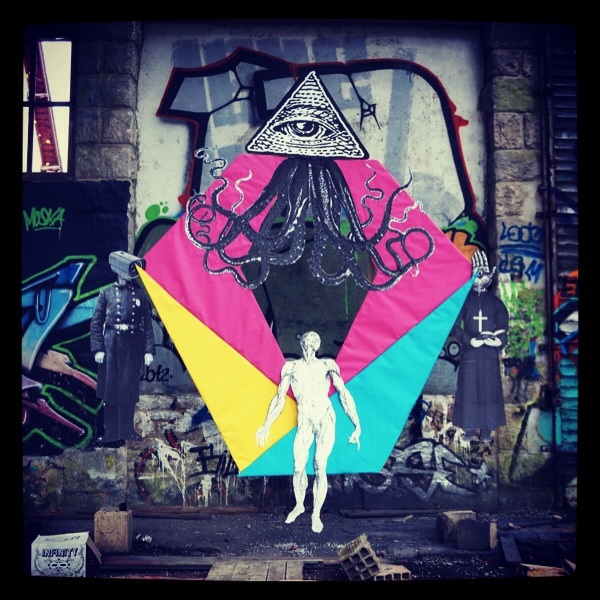 surveillance Big Brother illuminati religion police CCTV control wheatpaste tentacles octopus freemasons eye triangle priest urban art
