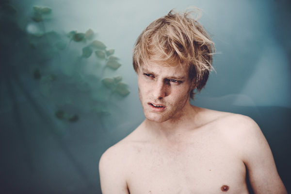 man portrait blond freckels